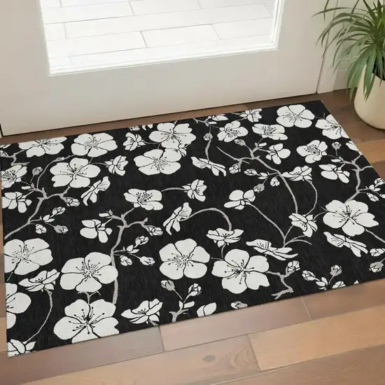 Black And Ivory Floral Washable Area Rug With UV Protection Photo 1