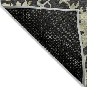 Photo of Black And Ivory Floral Washable Indoor Outdoor Area Rug