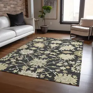 Photo of Black And Ivory Floral Washable Indoor Outdoor Area Rug
