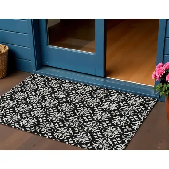 Black And Ivory Floral Washable Indoor Outdoor Area Rug Photo 1
