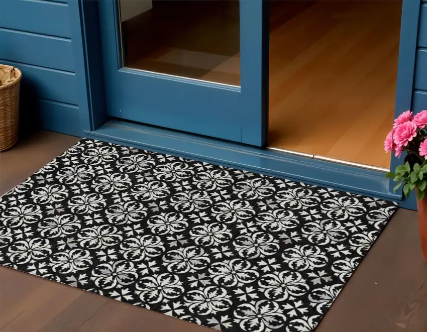 Black And Ivory Floral Washable Indoor Outdoor Area Rug Photo 1