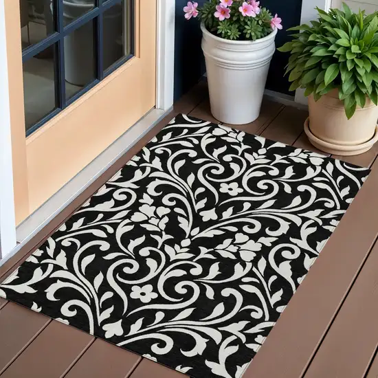 Black And Ivory Floral Washable Indoor Outdoor Area Rug Photo 1