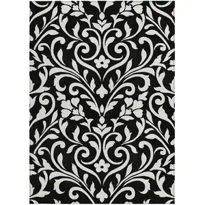 Photo of Black And Ivory Floral Washable Indoor Outdoor Area Rug