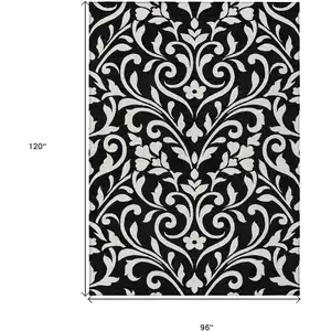 Photo of Black And Ivory Floral Washable Indoor Outdoor Area Rug