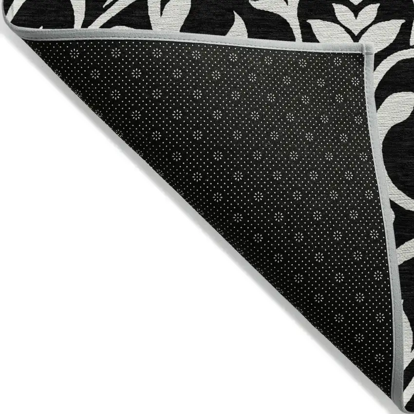 Black And Ivory Floral Washable Indoor Outdoor Area Rug Photo 4