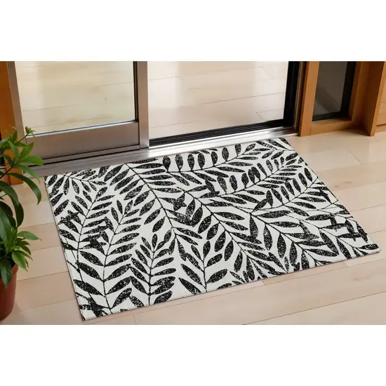 Black And Ivory Floral Washable Indoor Outdoor Area Rug Photo 1