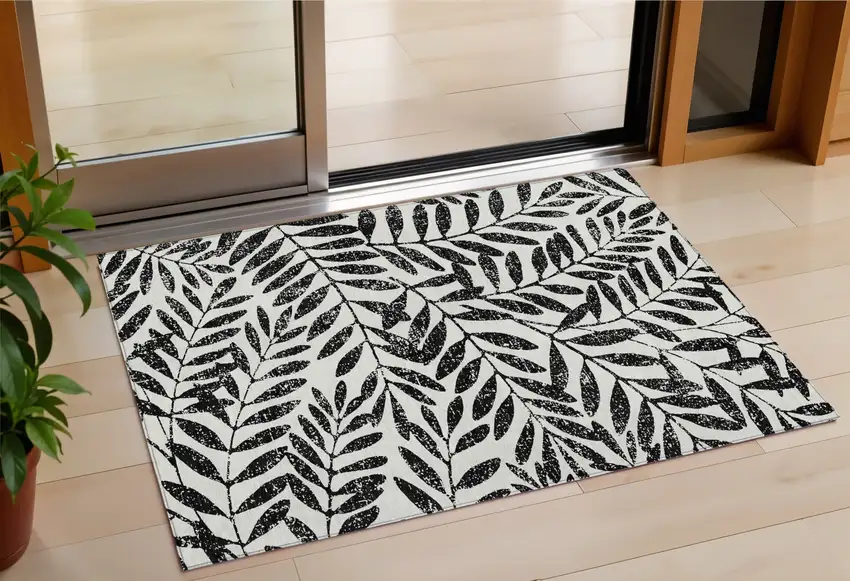 Black And Ivory Floral Washable Indoor Outdoor Area Rug Photo 1