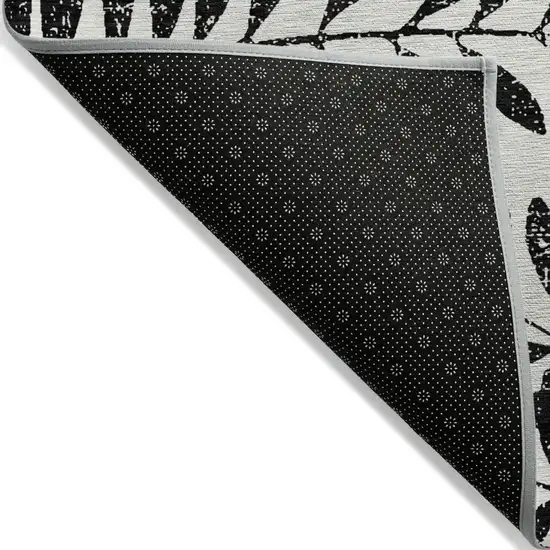 Black And Ivory Floral Washable Indoor Outdoor Area Rug Photo 4