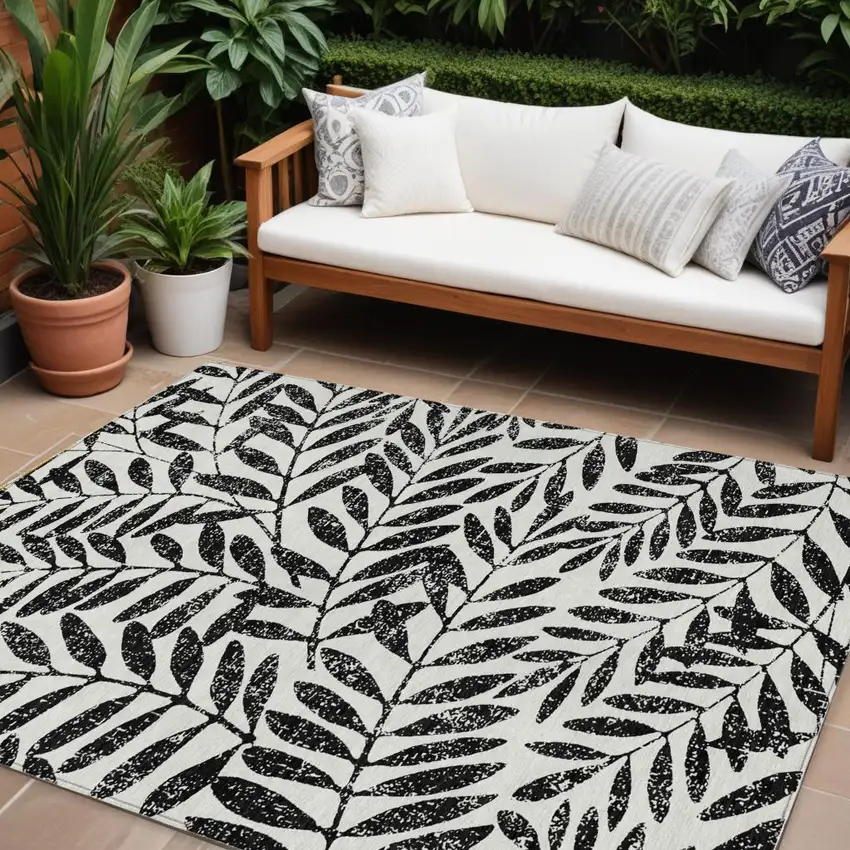 Black And Ivory Floral Washable Indoor Outdoor Area Rug Photo 1
