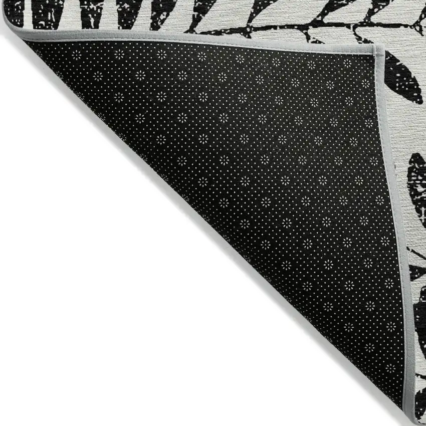 Black And Ivory Floral Washable Indoor Outdoor Area Rug Photo 4