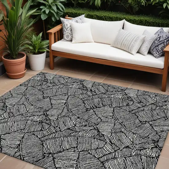 Black And Ivory Floral Washable Indoor Outdoor Area Rug Photo 1
