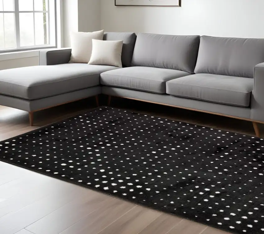 Black And Ivory Geometric Area Rug Photo 1