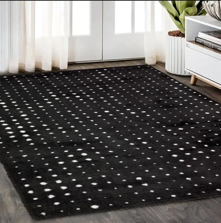 Black And Ivory Geometric Area Rug Photo 1