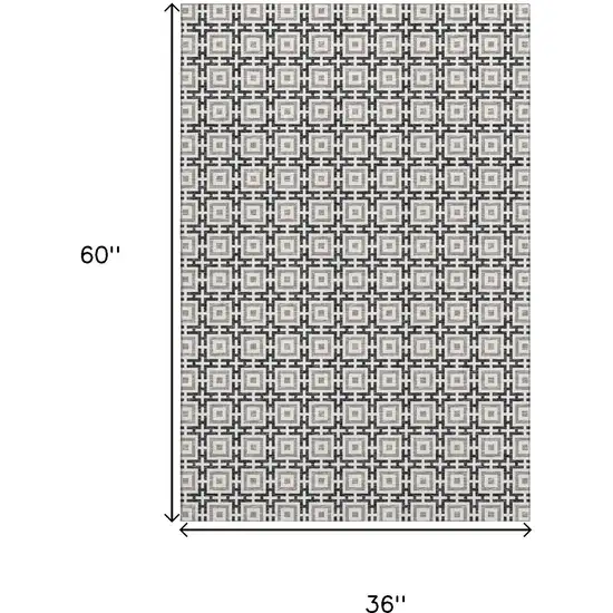 Black And Ivory Geometric Washable Area Rug With UV Protection Photo 3