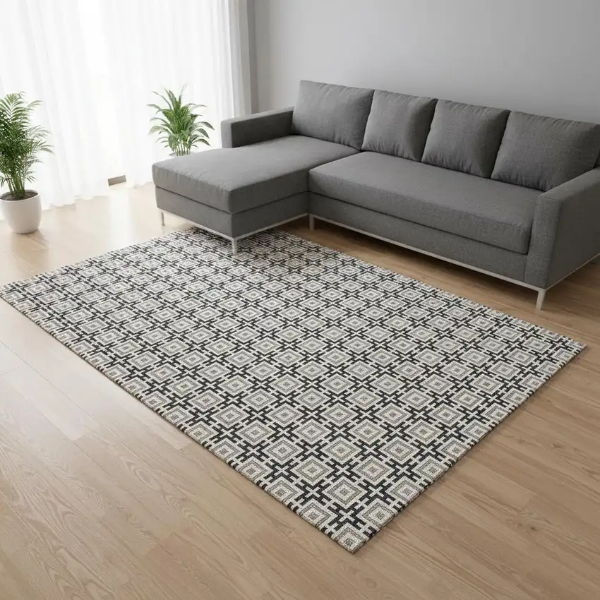 Black And Ivory Geometric Washable Area Rug With UV Protection Photo 1