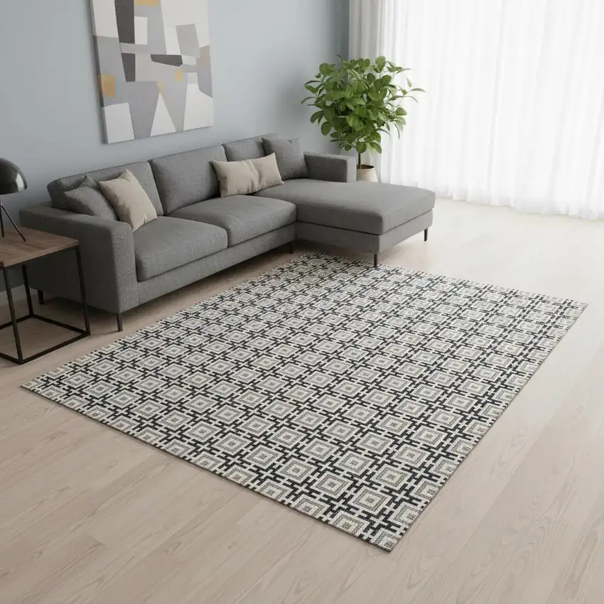 Black And Ivory Geometric Washable Area Rug With UV Protection Photo 1