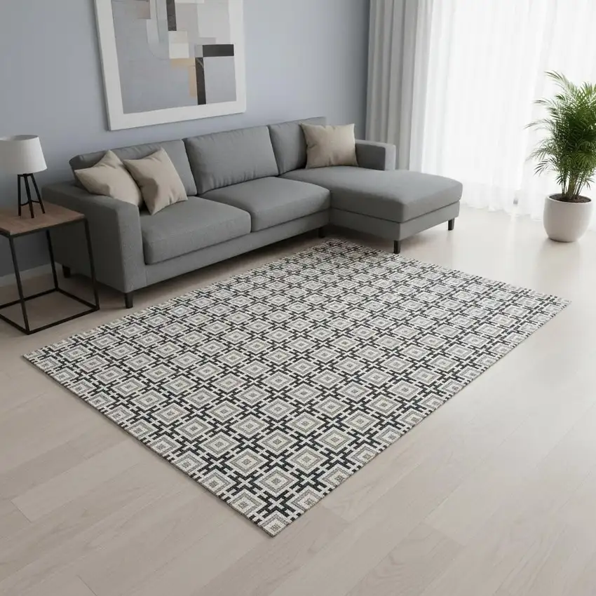 Black And Ivory Geometric Washable Area Rug With UV Protection Photo 1