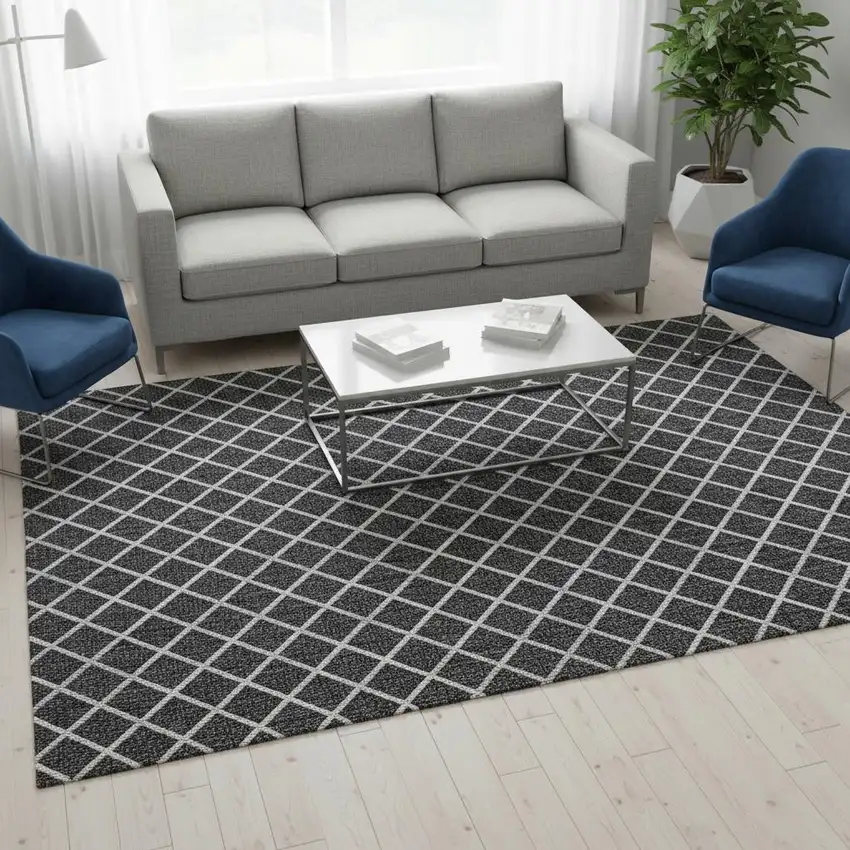 Black And Ivory Geometric Washable Area Rug With UV Protection Photo 1