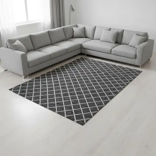 Black And Ivory Geometric Washable Area Rug With UV Protection Photo 1