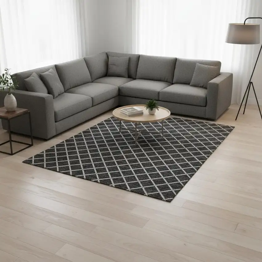 Black And Ivory Geometric Washable Area Rug With UV Protection Photo 1