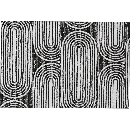 Black And Ivory Geometric Distressed Washable Area Rug With UV Protection Photo 2