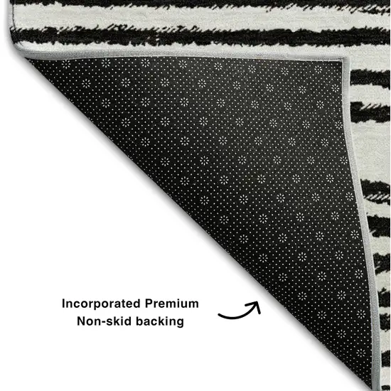 Black And Ivory Geometric Washable Area Rug With UV Protection Photo 7