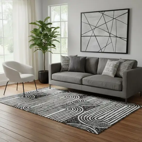 Black And Ivory Geometric Washable Area Rug With UV Protection Photo 1