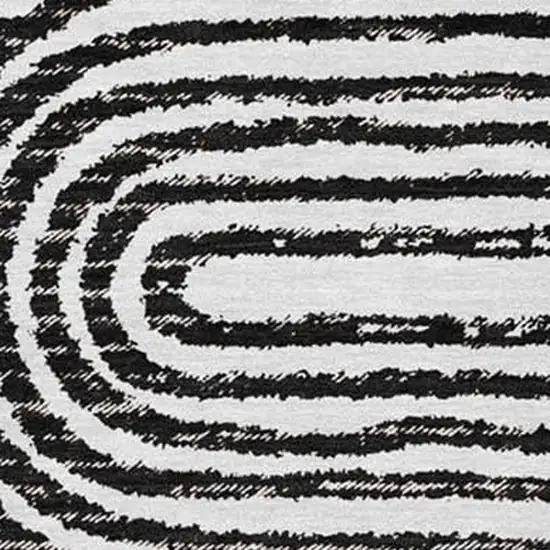 Black And Ivory Geometric Washable Area Rug With UV Protection Photo 4
