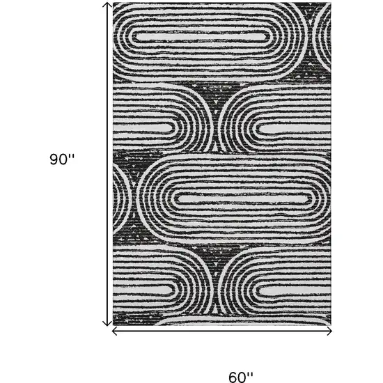 Black And Ivory Geometric Washable Area Rug With UV Protection Photo 3