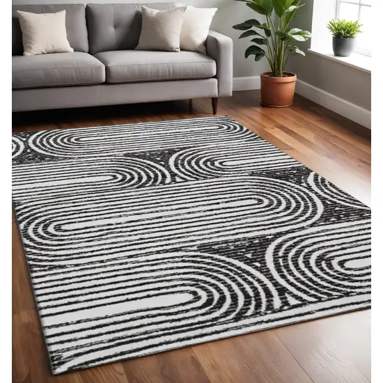 Black And Ivory Geometric Washable Area Rug With UV Protection Photo 2