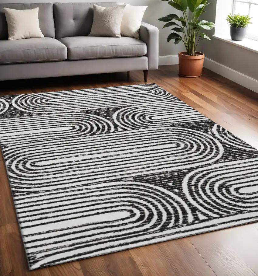 Black And Ivory Geometric Washable Area Rug With UV Protection Photo 2