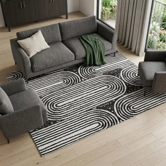 Black And Ivory Geometric Washable Area Rug With UV Protection Photo 1