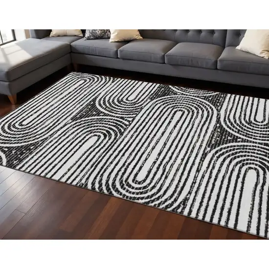 Black And Ivory Geometric Washable Area Rug With UV Protection Photo 2