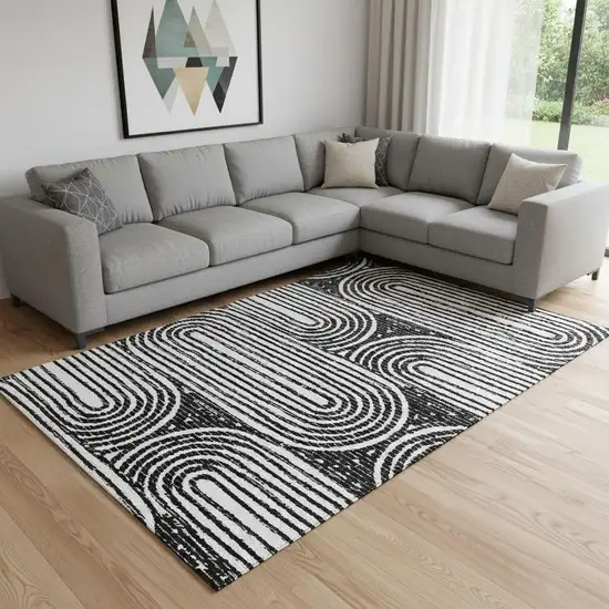 Black And Ivory Geometric Washable Area Rug With UV Protection Photo 1