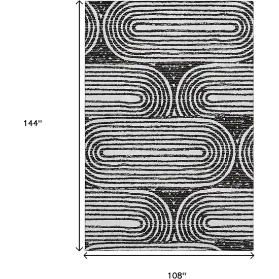 Black And Ivory Geometric Washable Area Rug With UV Protection Photo 3
