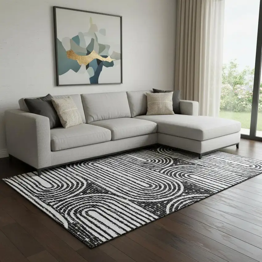 Black And Ivory Geometric Washable Area Rug With UV Protection Photo 1
