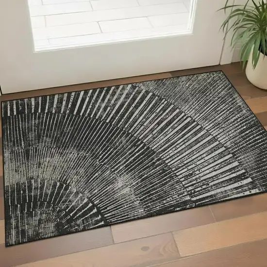 Black And Ivory Geometric Washable Area Rug With UV Protection Photo 1