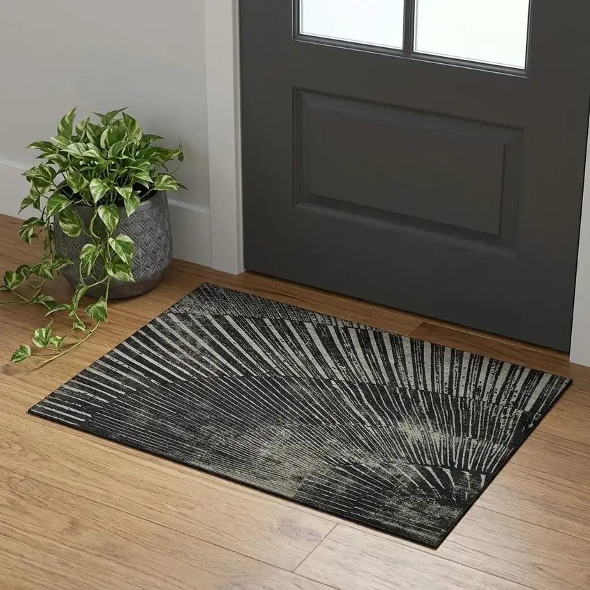 Black And Ivory Geometric Washable Area Rug With UV Protection Photo 1