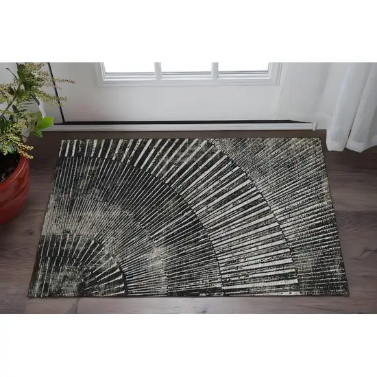Black And Ivory Geometric Washable Area Rug With UV Protection Photo 2