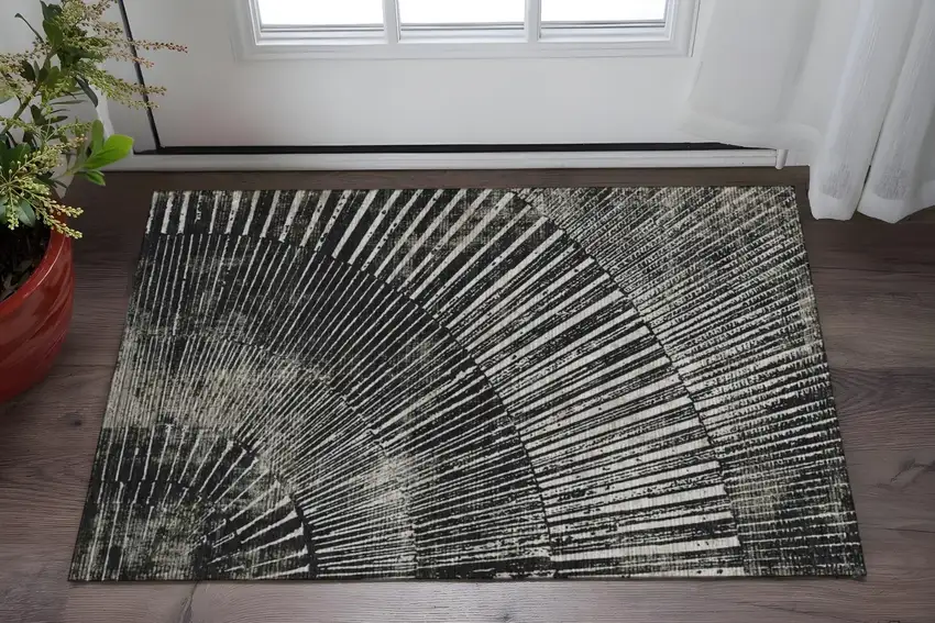 Black And Ivory Geometric Washable Area Rug With UV Protection Photo 2