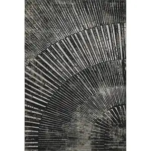 Photo of Black And Ivory Geometric Washable Area Rug With UV Protection