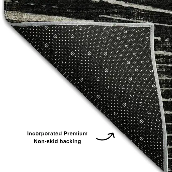 Black And Ivory Geometric Washable Area Rug With UV Protection Photo 6