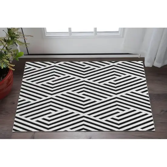 Black And Ivory Geometric Washable Area Rug With UV Protection Photo 2