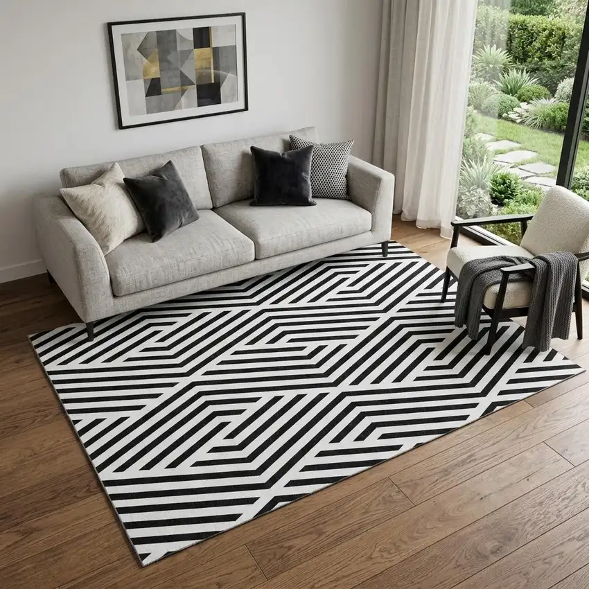 Black And Ivory Geometric Washable Area Rug With UV Protection Photo 1