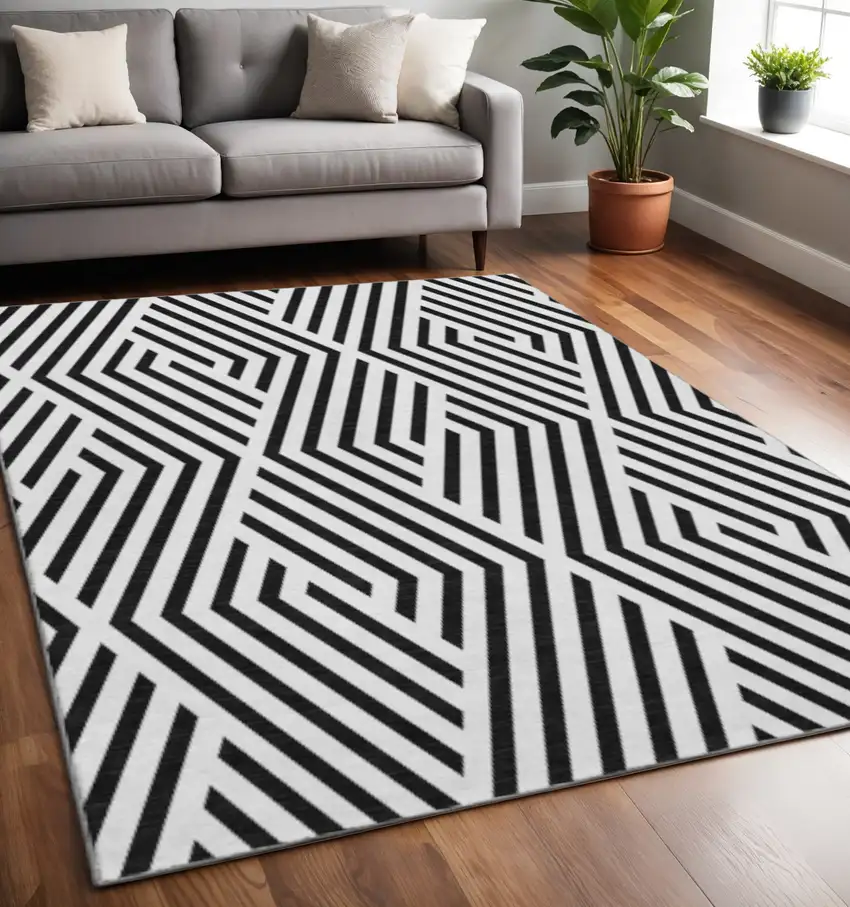Black And Ivory Geometric Washable Area Rug With UV Protection Photo 2
