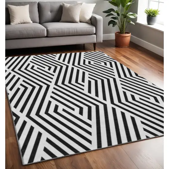 Black And Ivory Geometric Washable Area Rug With UV Protection Photo 2