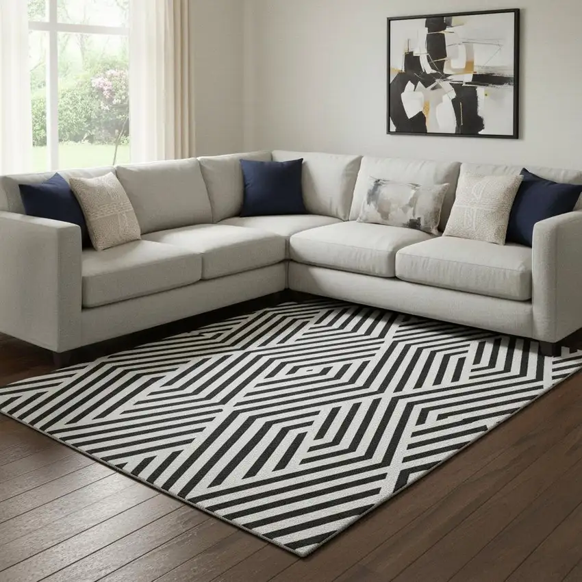 Black And Ivory Geometric Washable Area Rug With UV Protection Photo 1