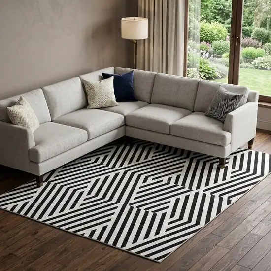 Black And Ivory Geometric Washable Area Rug With UV Protection Photo 1