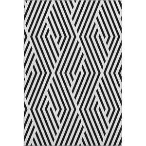 Photo of Black And Ivory Geometric Washable Area Rug With UV Protection