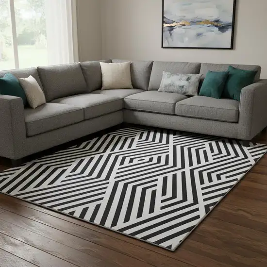 Black And Ivory Geometric Washable Area Rug With UV Protection Photo 1